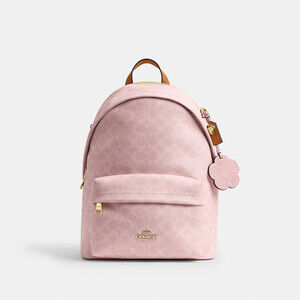 Coach Outlet Taylor Small Backpack In Signature Canvas With Charms